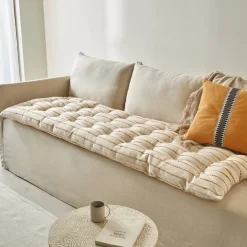 Lang, decoratief kussen in artisanaal weefsel
