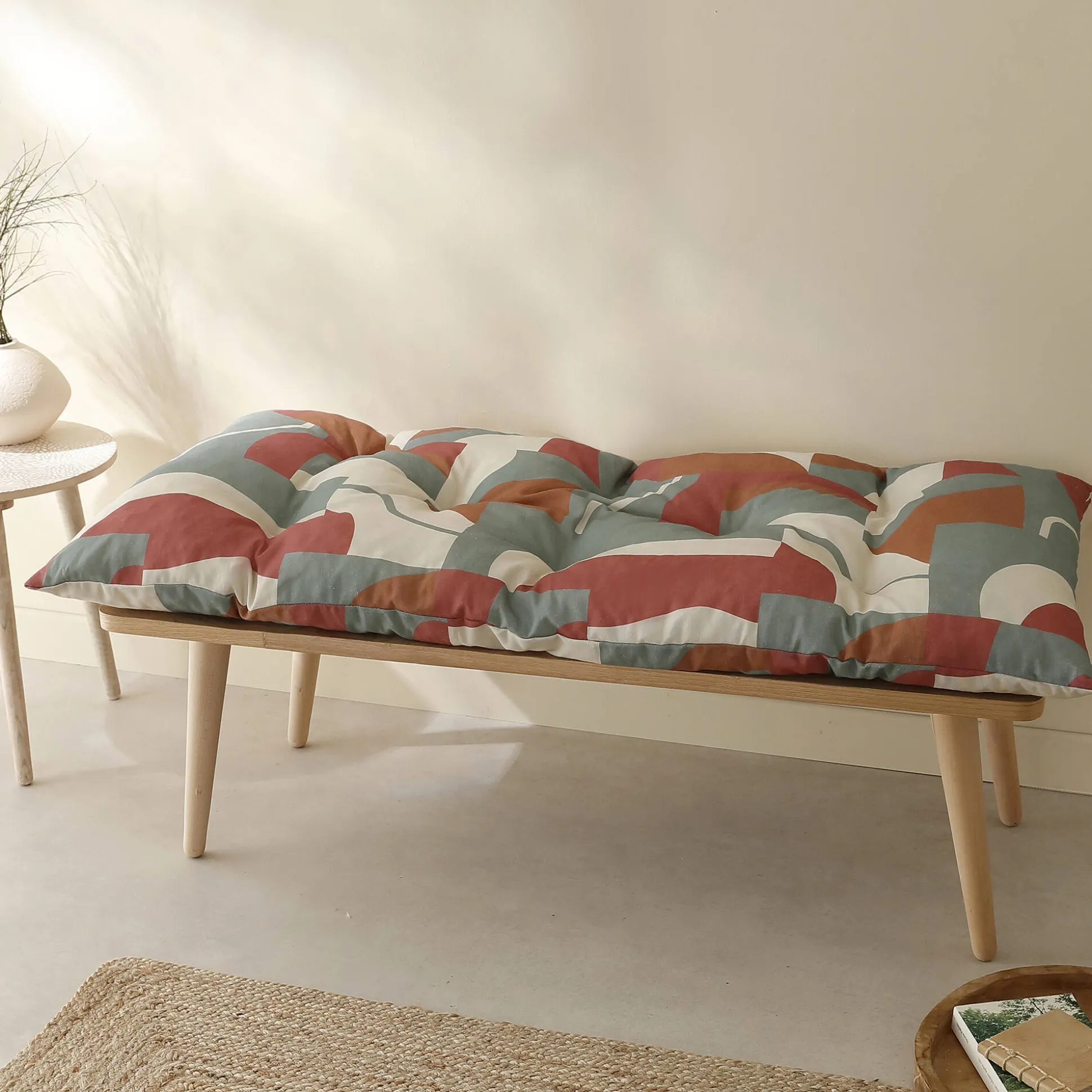 Lang vloerkussen met 'geometrische' print