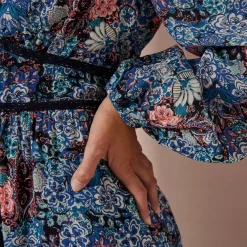 Lange jurk met bloemenprint en afwerkingen in macramé