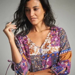 Lange jurk met patchworkprint en V-hals