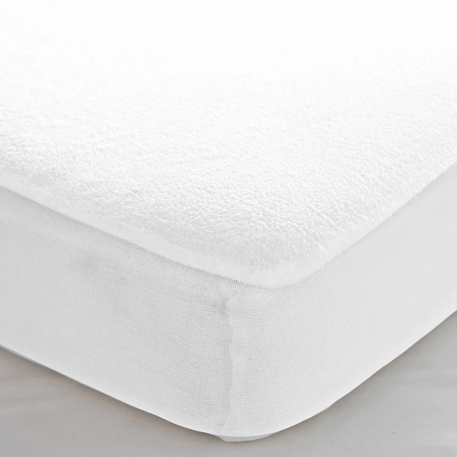 Matrasbeschermer in absorberend, gerecycleerd katoenmolton, hoeken van 29 cm