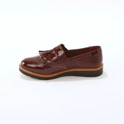 Mocassins met pompons en franjes