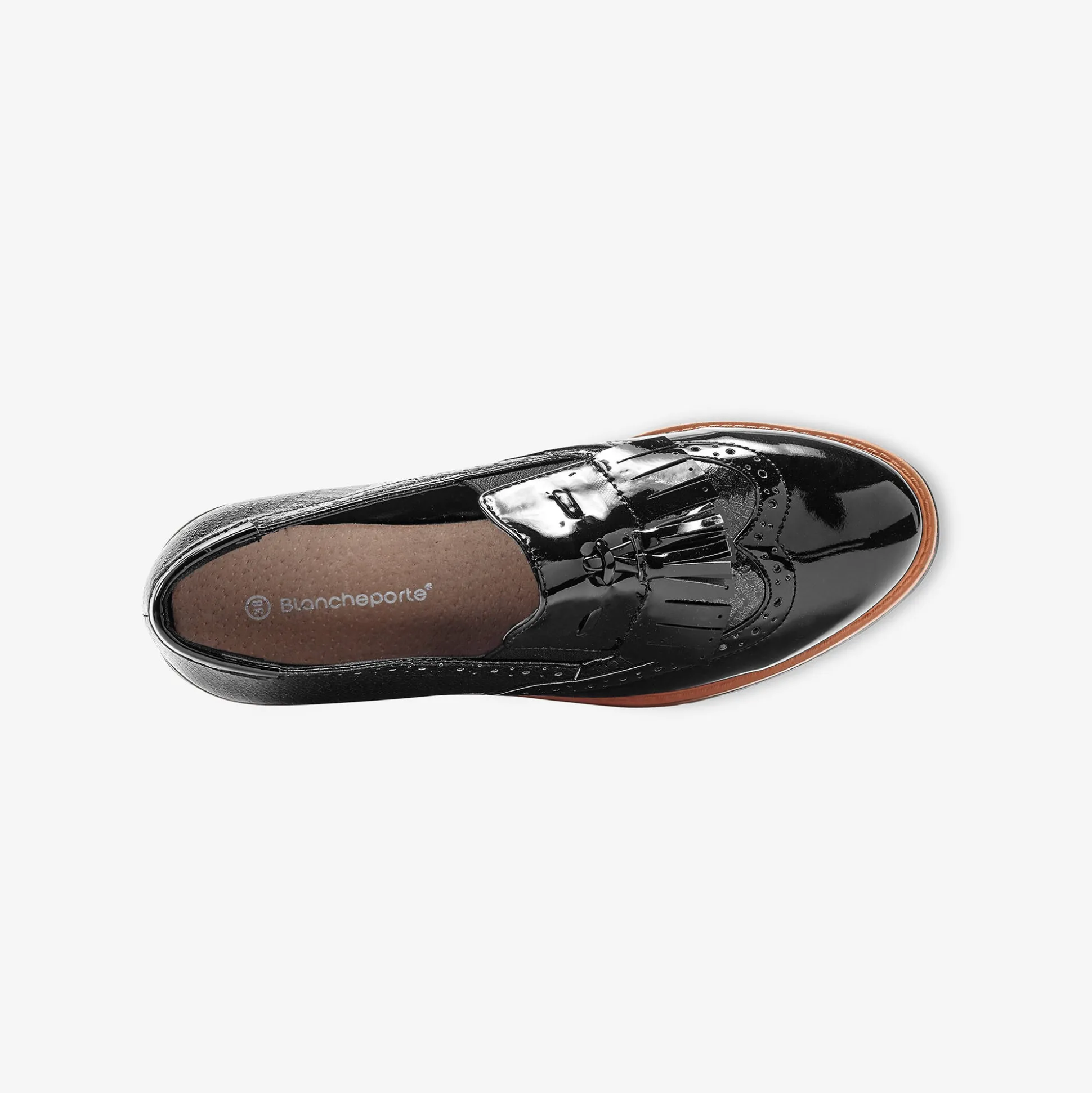 Mocassins met pompons en franjes