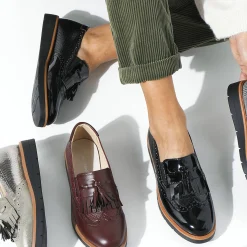Mocassins met pompons en franjes