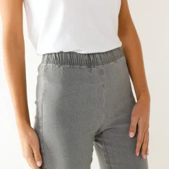 Modellerende jeans met 'platte buik' effect en elastische taille