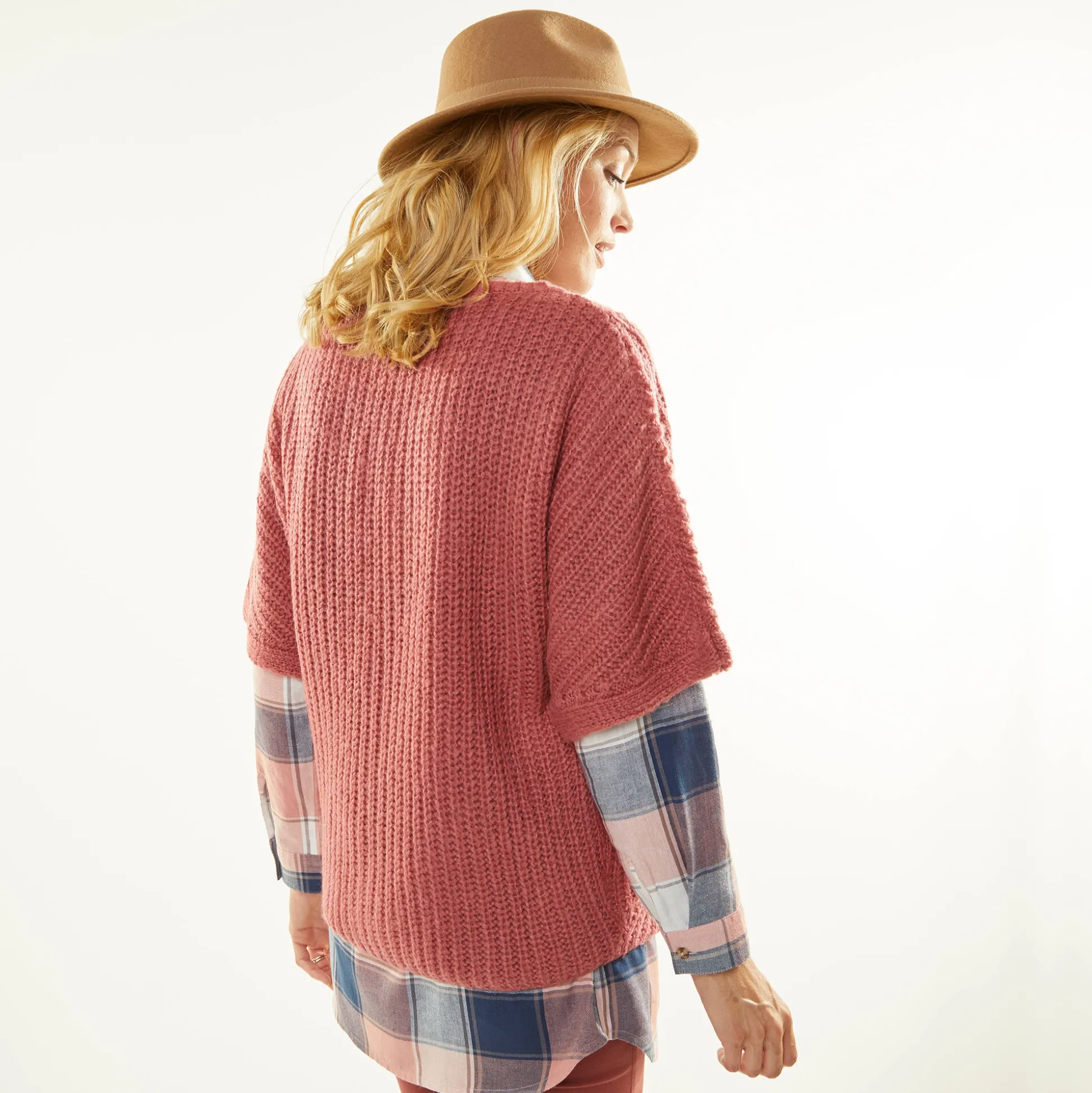 Poncho trui met mouwen op ellebooglengte