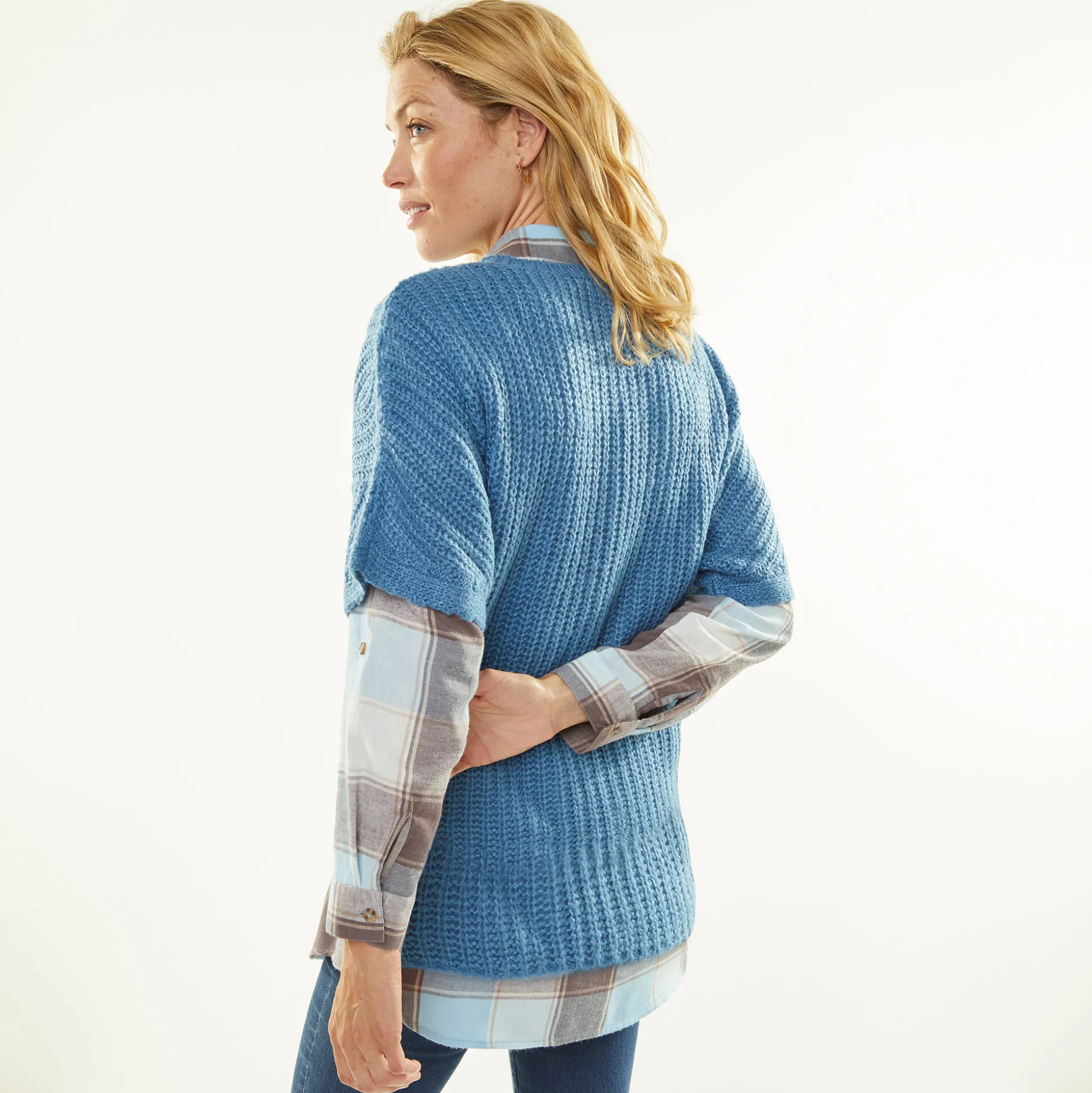 Poncho trui met mouwen op ellebooglengte