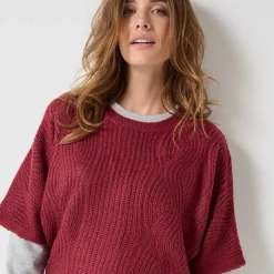 Poncho trui met mouwen op ellebooglengte