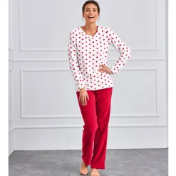 Pyjama in fleece met stippenprint, pluchetouch en lange mouwen