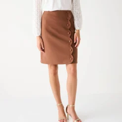 Rok met knoopsluiting en festonrand