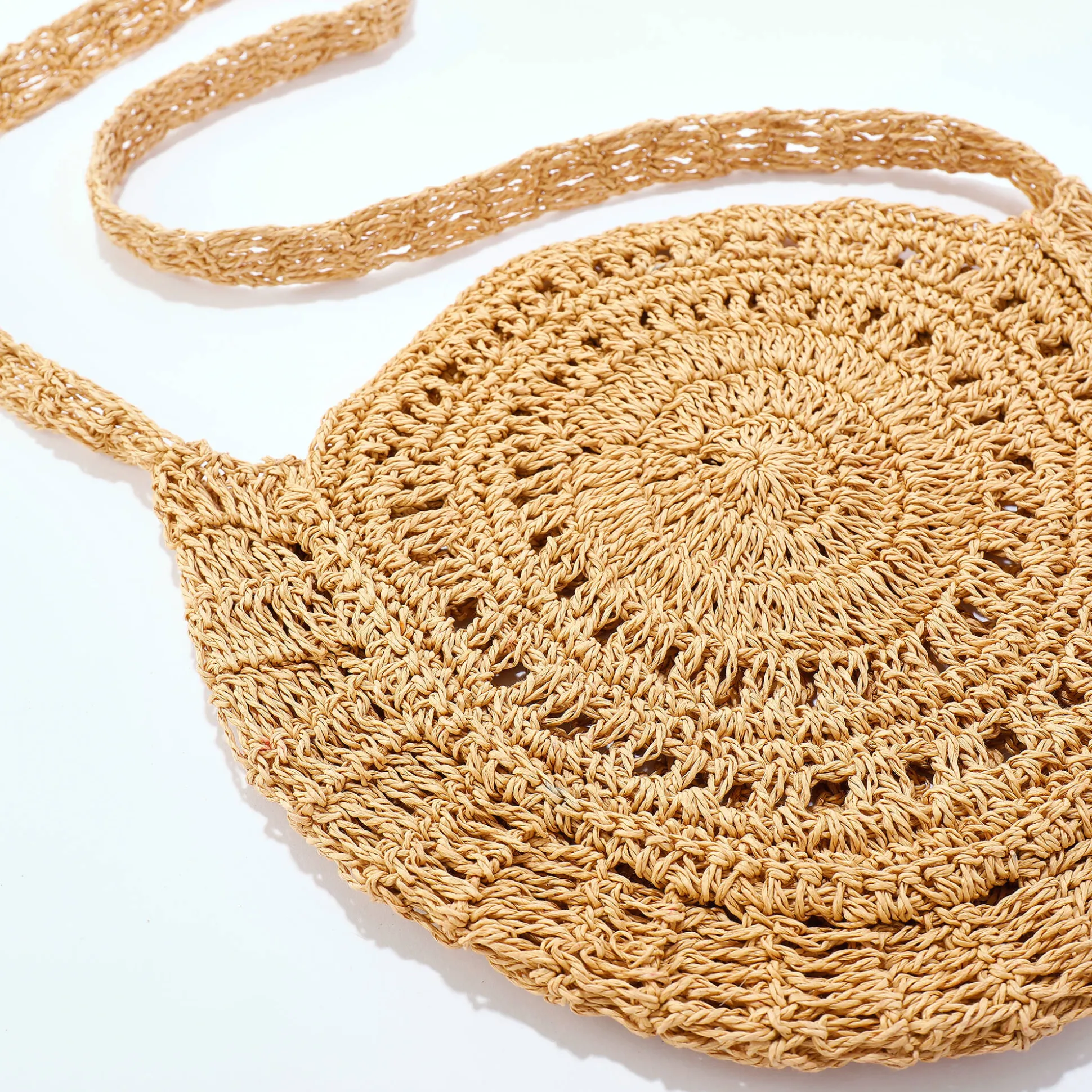 Ronde tas in 'zon' model, in gevlochten jute