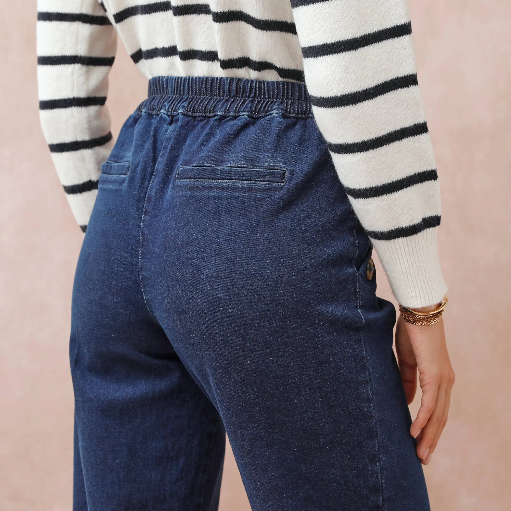 Ruime jeans met knooppandeffect