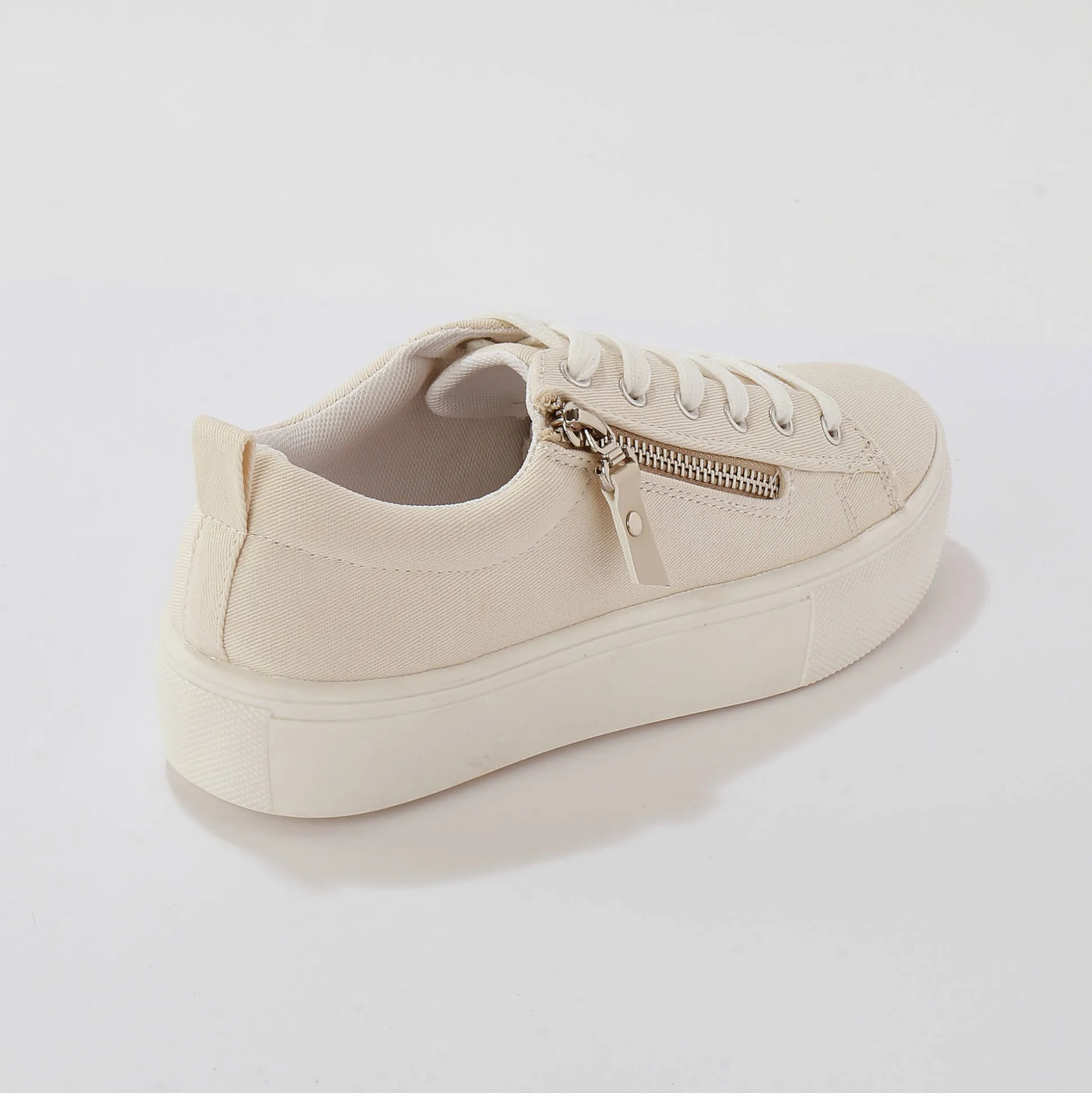 Sneakers in canvas, met sleehak, rits en veters