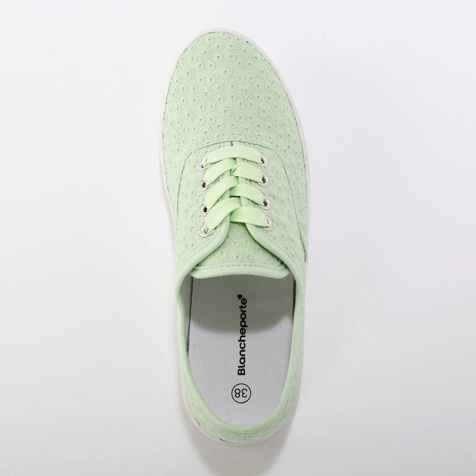 Sneakers in geborduurd canvas