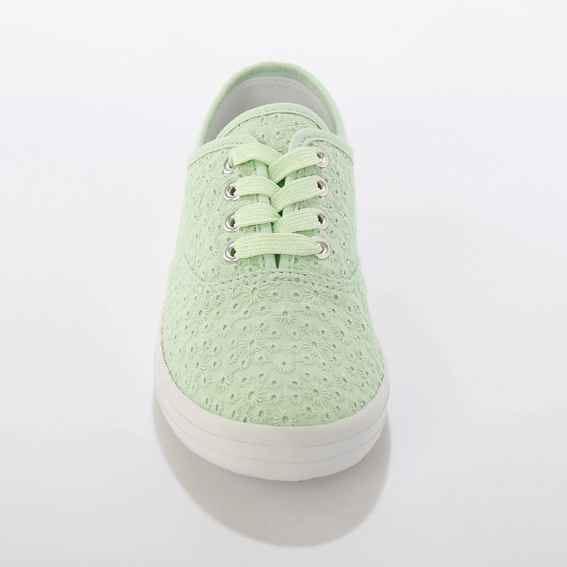 Sneakers in geborduurd canvas