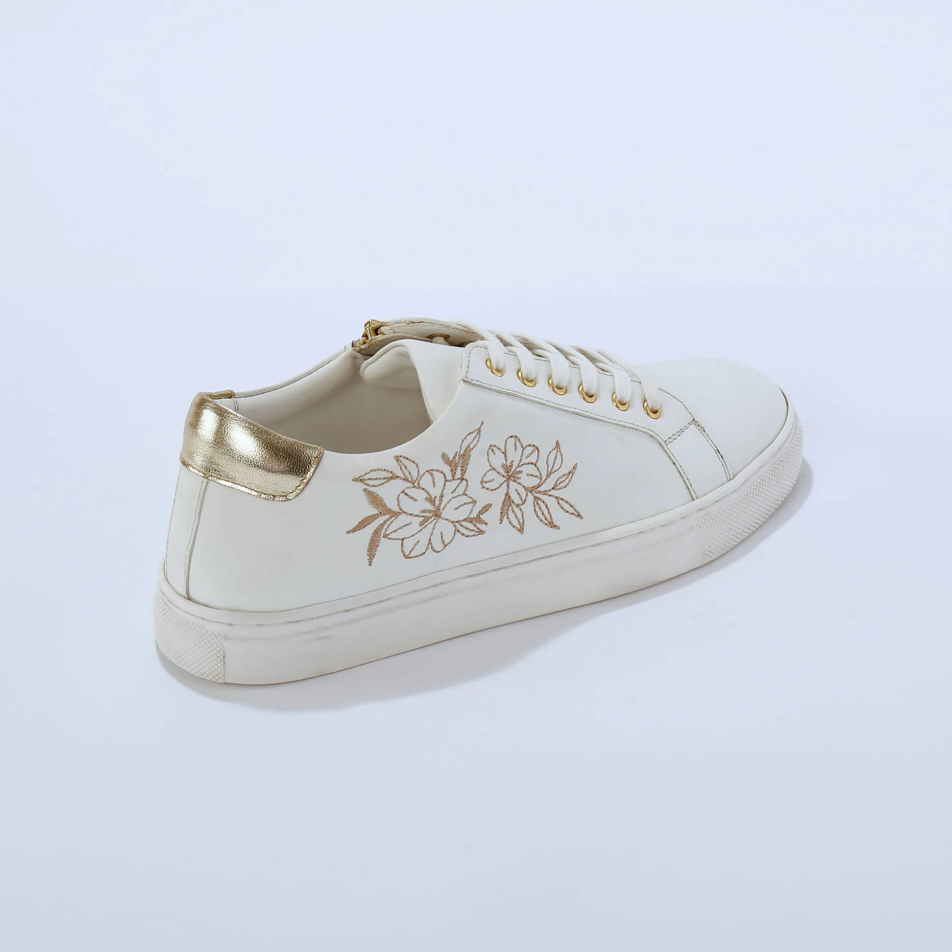 Sneakers met borduursel en rits