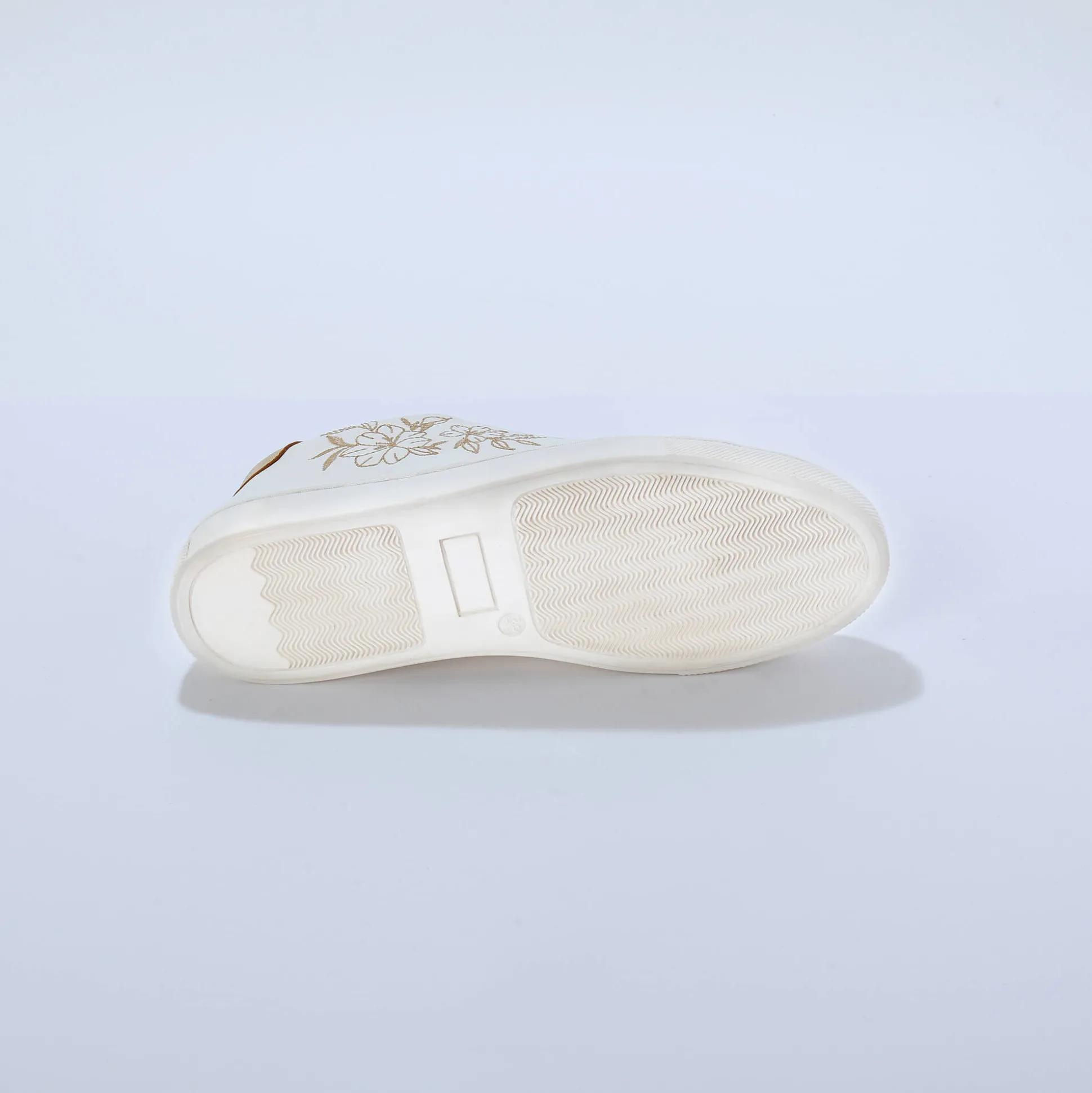 Sneakers met borduursel en rits