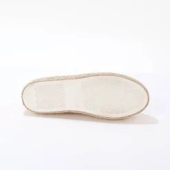 Sneakers met sleehak en koordzool