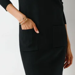 Trui-jurk in fijn tricot, met polokraag en zakken