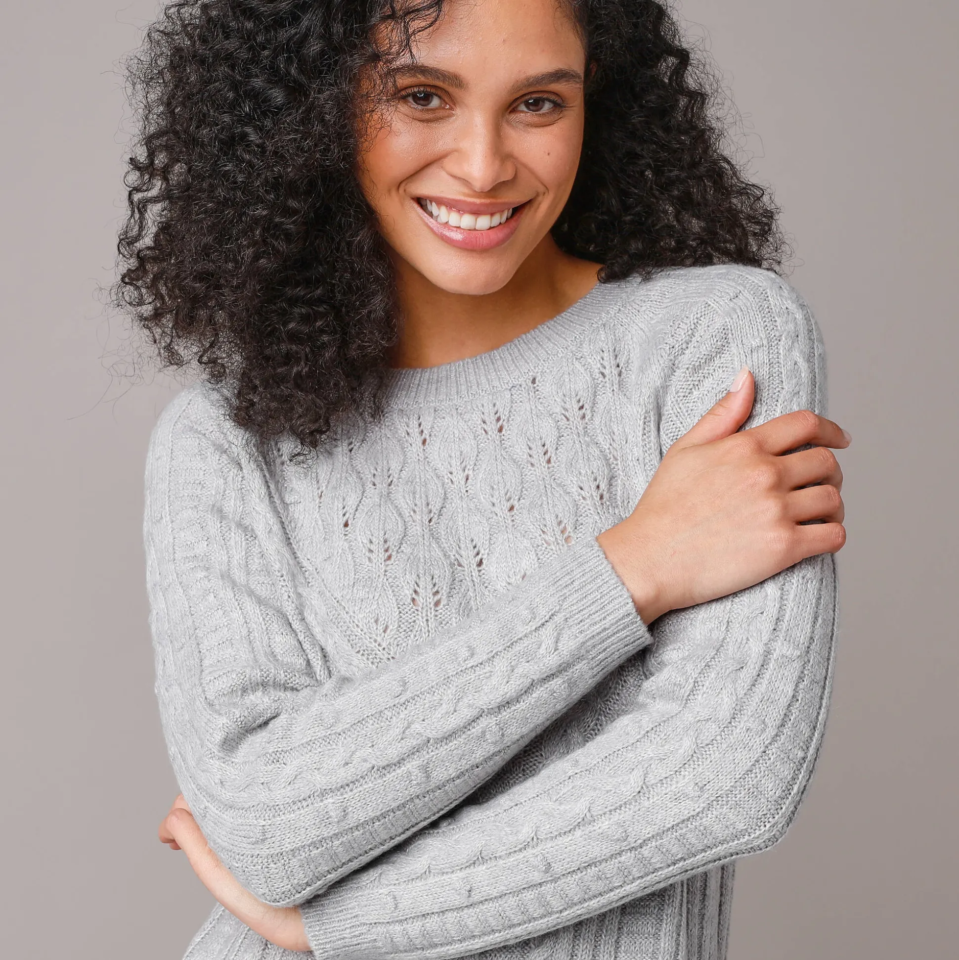 Trui-jurk in kabeltricot