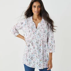 Tuniek met knopen, plooitjes en bloemenprint