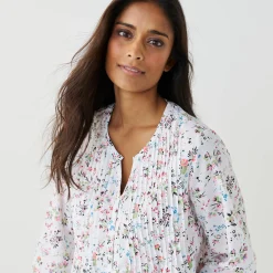 Tuniek met knopen, plooitjes en bloemenprint