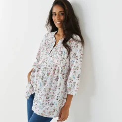 Tuniek met knopen, plooitjes en bloemenprint