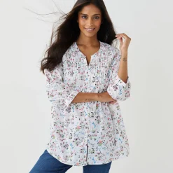 Tuniek met knopen, plooitjes en bloemenprint