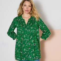 Tuniek met knopen, plooitjes en bloemenprint