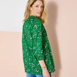 Tuniek met knopen, plooitjes en bloemenprint