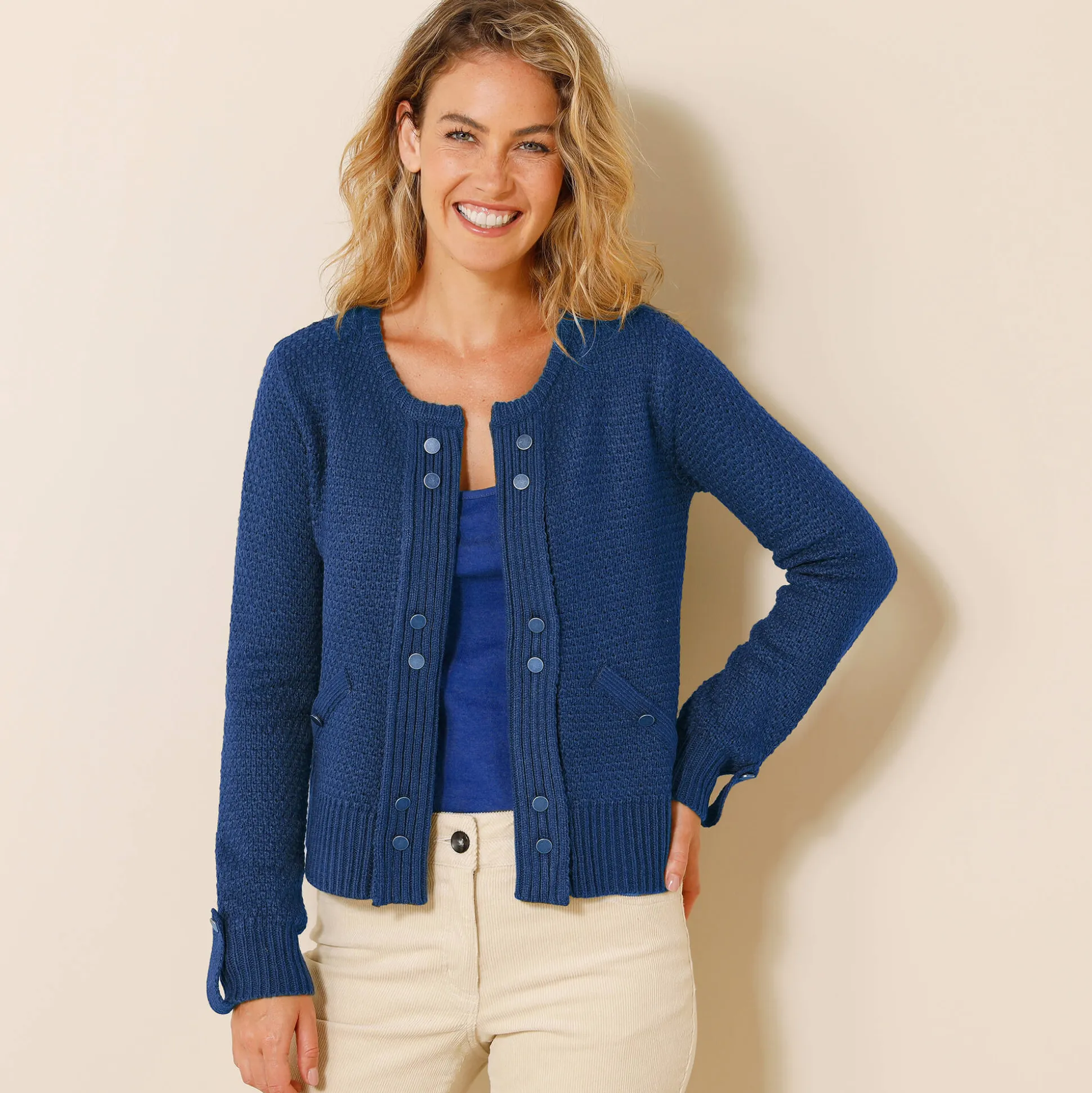 Vest in tricot met goudkleurige knopen