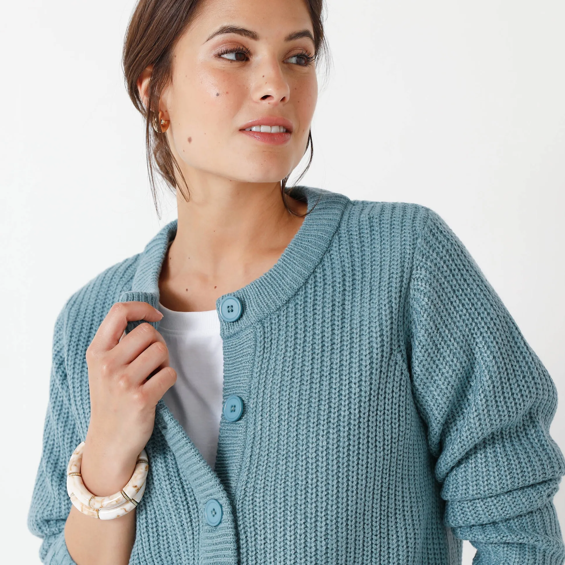 Vest met knopen in patenttricot