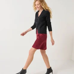 Vest met V-hals, knoopsluiting en asymmetrische onderkant