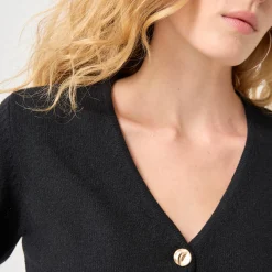 Vest met V-hals, knoopsluiting en asymmetrische onderkant