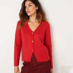 Vest met V-hals, knoopsluiting en asymmetrische onderkant