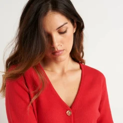Vest met V-hals, knoopsluiting en asymmetrische onderkant