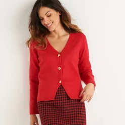 Vest met V-hals, knoopsluiting en asymmetrische onderkant