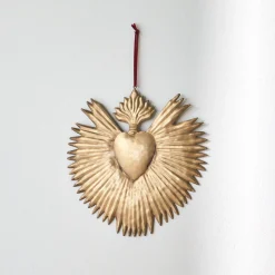Wanddecoratie ex voto, goudkleurig metaal