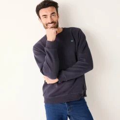 Warme sweater met ronde hals, borduursel op de borst, in ribtricot